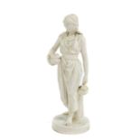 A Parian Figure of an Arab Girl, circa 1870, wearing traditional dress carrying a ewer and a