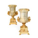 A Pair of Gilt Metal Mounted Veined Marble Campana Vases, modern, with ram's mask handles, on square