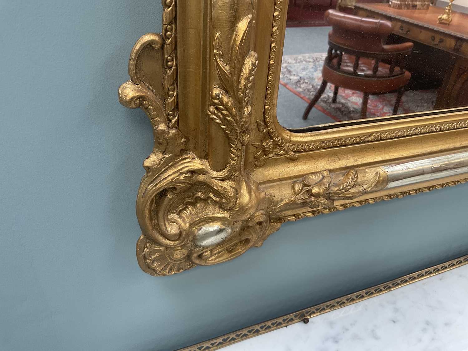 A Late 19th Century Gilt and Gesso Wall Mirror, the plain mirror plate surmounted with C scrolls and - Image 3 of 9
