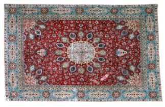 Tabriz Carpet North West Iran, circa 1950 The crimson field centred by a roundel medallion