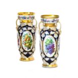 A Pair of French Porcelain Baluster Vases, circa 1870, with flared necks and scroll handles, painted