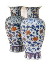 A Pair of Japanese Porcelain Vases, in Chinese taste, of baluster form with flared necks, painted in