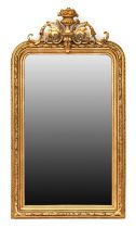 A Late 19th Century Gilt and Gesso Rectangular Wall Mirror, the plain mirror plate within a