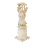 Italian School, circa 1900: An Alabaster Group of the Three Graces, supporting a circular bowl, on a