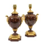 A Pair of Gilt Metal Mounted Rouge Marble Lamp Bases, in Louis XVI style, of ovoid form with leaf-