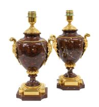 A Pair of Gilt Metal Mounted Rouge Marble Lamp Bases, in Louis XVI style, of ovoid form with leaf-