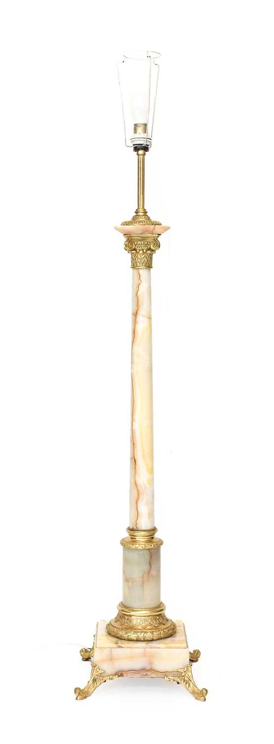An Alabaster and Gilt Metal Mounted Standard Lamp, 181cm high with shade This lot has been