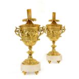 A Pair of Gilt Metal Table Lamps, in Louis XIV style, as twin-handled urns cast with fruit and