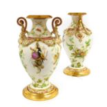 A Pair of Staffordshire Porcelain Vases, circa 1870, of baluster form with scroll handles hung