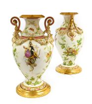 A Pair of Staffordshire Porcelain Vases, circa 1870, of baluster form with scroll handles hung