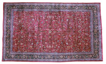 Mashad Carpet North East Iran, dated 1911 The aubergine field with an all over design of scrolling