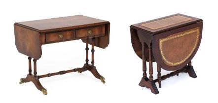 A Mahogany and Leather Top Sutherland Table, modern, with two rounded drop leaves, on spindle turned