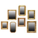 Seven Assorted 20th Century Gilt and Gesso Mirrors, comprising a rectangular example with bevelled