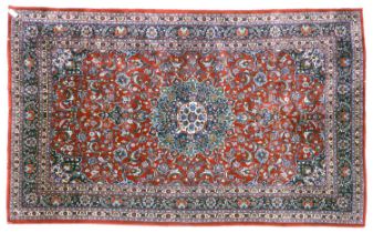 Kashan Design Carpet Central Iran, circa 1970 The claret field of vines around an indigo medallion