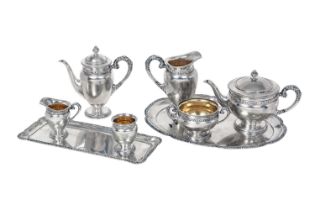 A Six-Piece Austro-Hungarian Silver Tea and Coffee-Service With Two Trays En Suite, by Antal