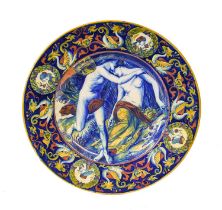 A Gubbio Maiolica Charger, late 19th/early 20th century, painted in colours and lustre with Cupid