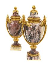 A Pair of Gilt Metal Mounted Pink and Grey Marble Urn Shape Vases and Fixed Covers, in Louis XVI