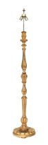 A Carved Giltwood Standard Lamp, modern, the acanthus-carved baluster support on a circular platform