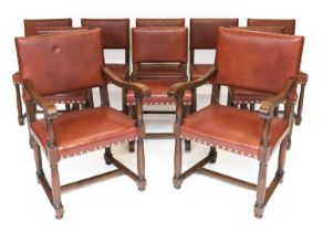 A Set of Twelve (10+2) Oak Dining Chairs, 1st half 20th century, recovered in close-nailed brown