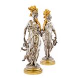 After Albert Ernest Carrier Belleuse (1820-1887): A Pair of Silvered and Gilt Bronze Figures of