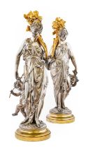 After Albert Ernest Carrier Belleuse (1820-1887): A Pair of Silvered and Gilt Bronze Figures of