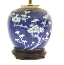 A Chinese Porcelain Ginger Jar, 19th century, mounted as a tablelamp, painted in underglaze blue