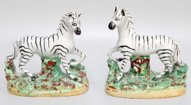 A Pair of Staffordshire Pottery Models of Zebra, mid-19th century, possibly by Thomas Parr, 12.5cm
