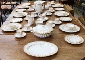 A Spode Porcelain Dinner, Tea and Coffee Service, decorated in fleur de Lys Gold, comprising 2