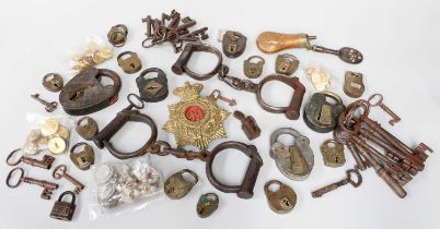 A Pair of Victorian Hiatt Iron Handcuffs; together with various 18th-century and later padlocks