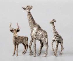 Two Models of Giraffes and a Silver Model of a Kudu, The Kudu Stamped '950', each realistically