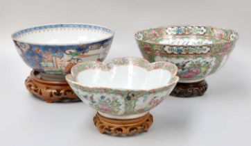 A Chinese Porcelain Bowl, 18th century, painted in coloured enamels with figures on an underglaze