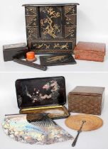 A Japanese Lacquer Kodansu, Meiji period, with two banks of three square drawers flanking a