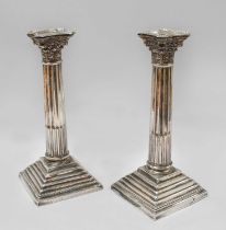 A Pair of Edward VII Silver Candlesticks, by William Henry Sparrow, Birmingham, 1904, on stepped and