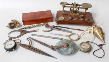 Two 19th Century Bronze Plumb Bobs; together with a Paas & Co. bookbinders roll, cartographers tools