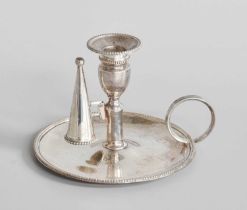 A George III Silver Chamber Candlestick, by Elizabeth Jones, London, 1785, circular and with