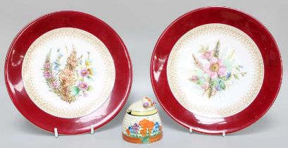 A Clarice Cliff Crocus Honey Hot, together with two hand painted Royal Crown Derby dessert plates (