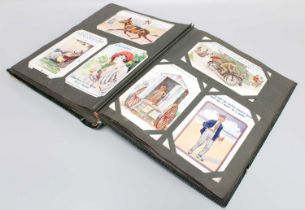 An Antique Postcard Album with 80 Early Humorous Postcards