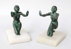 A Pair Art Deco Figural Bookends, each formed as a crouching nude maiden in verdigris patina and