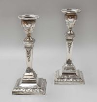 A Pair of George V Silver Candlesticks, by Hawksworth, Eyre and Co. Ltd., Sheffield, 1919, each on