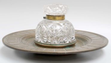 A Bronze Dish Formed Inkstand, 19th century, with a large cut glass inkwell mounted to the centre,