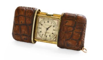 A Gilt Metal Movado Purse Watch The outer leather surfaces with are slightly faded and small signs