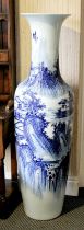 A Large Chinese Porcelain Floor Vase, 20th Century, decorated in underglaze blue and iron red with a