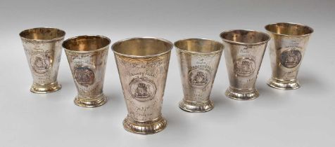 Six Various Swedish Silver Beakers, each tapering cylindrical and on spreading foot with fluted