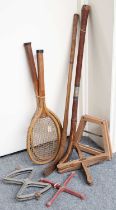 Two Antique Hockey Sticks, one by George Bussey and Co and one by Sunbeam, together with four racket