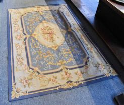 An Aubusson Design Rug, the steel blue field of vines centered by floral panels enclosed by mushroom