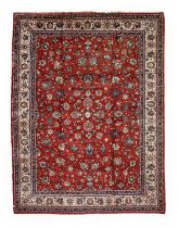 Saroukh Carpet West Iran, circa 1970 The blood red field with an allover design of palmettes and