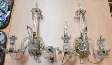 A Pair of George III Style Cut Glass Twin Light Wall Sconces, each ornamented with a central spire