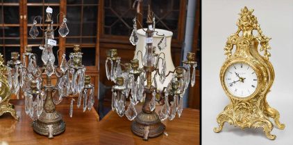 A Pair of Lustre Drop and Gilt Metal Candelabra, eight light, 55cm high; together with a Brass Cased