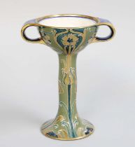 William Moorcroft (1872-1945) for James Macintyre: A Green and Gold Florian Pattern Twin-Handled