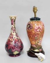 A Modern Moorcoft Slender Vase, "Pasque Flower" pattern by Philip Gibson, 31cm high, together with a